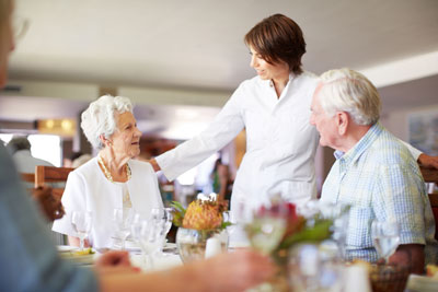 Restaurant server and guests